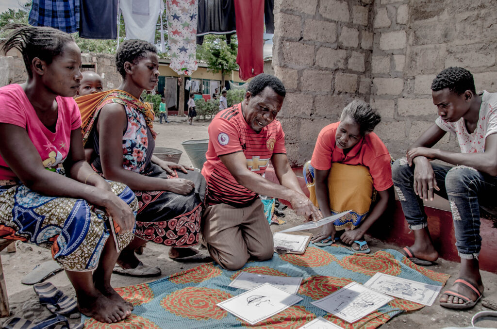 Water crisis support - person talking to a group