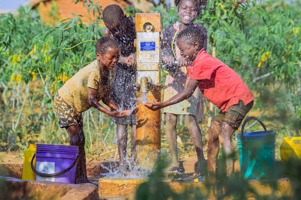 Children around a safe water source